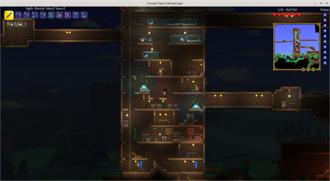 Screenshot from Terraria, showing a building with many floors, and plenty of animals.