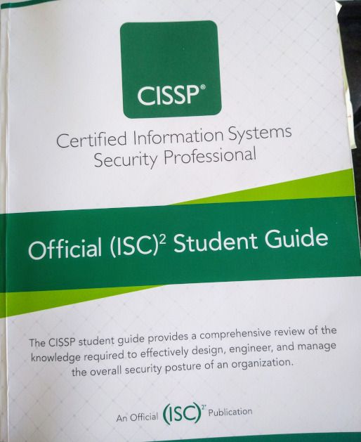 The green and white front cover of the Official (ISC)2 Student Guide.