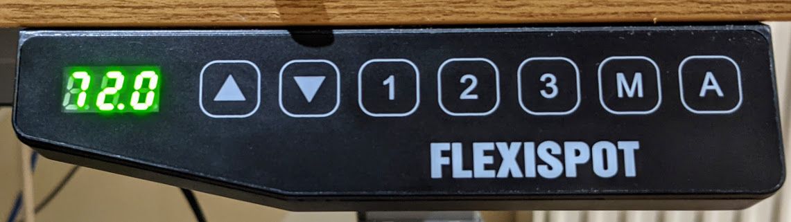 Black control pad with a green LED display saying 72.0.  To the right of the display are seven buttons and the brand name "Flexispot".