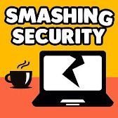 "Smashing Security" logo, with the title text in white capitals on a warm yellow background.  There's a cup of tea next to a laptop with a cracked screen.