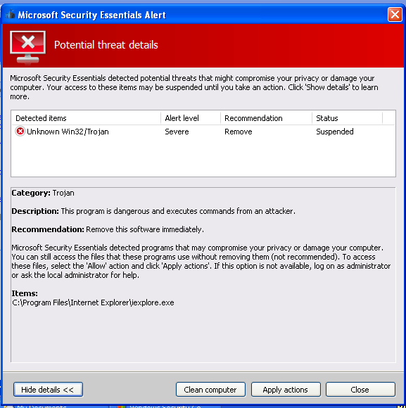 Screenshot showing a Microsoft Security Essentials alert that a threat had been detected.  The heading is red with warning cross symbols.