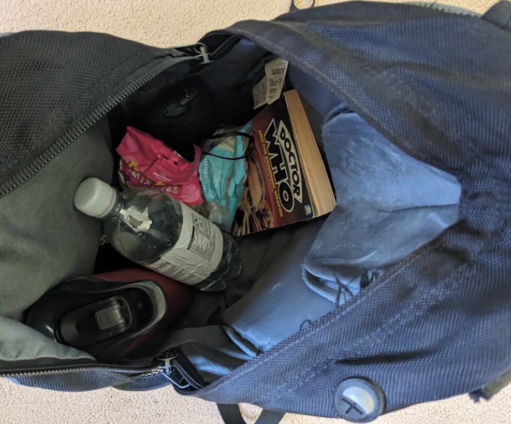 Photograph of the pile of stuff from above in a 25 litre rucksack.