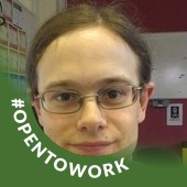 Photograph showing Jonathan, a man with glasses and brown hair, with an office in the background. There is a green curve across the bottom left corner which contains the curved text "#opentowork".