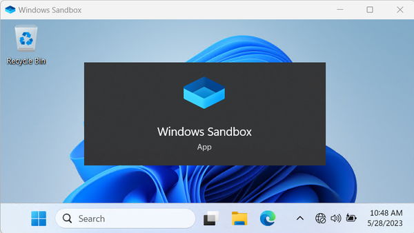 Screenshot of a Windows 11 Sandbox running in a window.  The "Windows Sandbox" start menu option is overlaid.